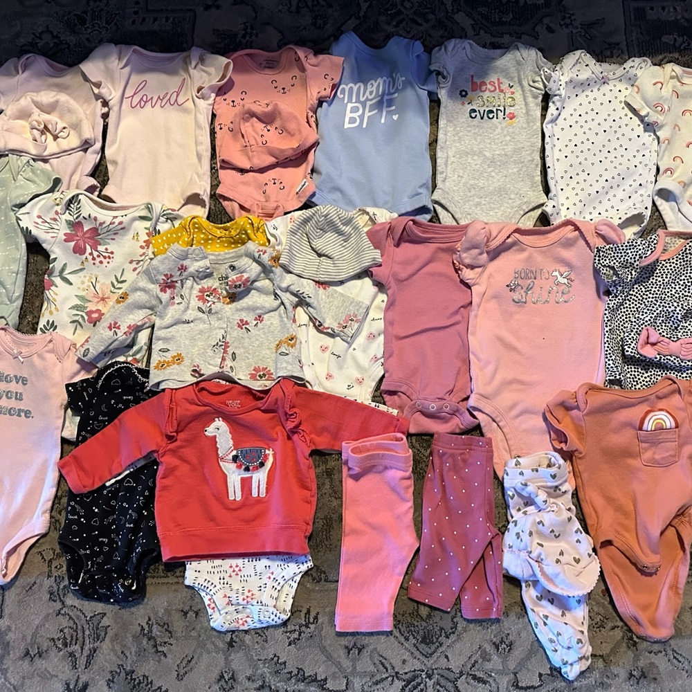 Lightly used baby girls clothes sized newborn and 0-3 month